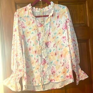 Multi colored blouse with necklace.  Elastic cuffs